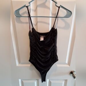 Toska. Sz small  bodysuit black